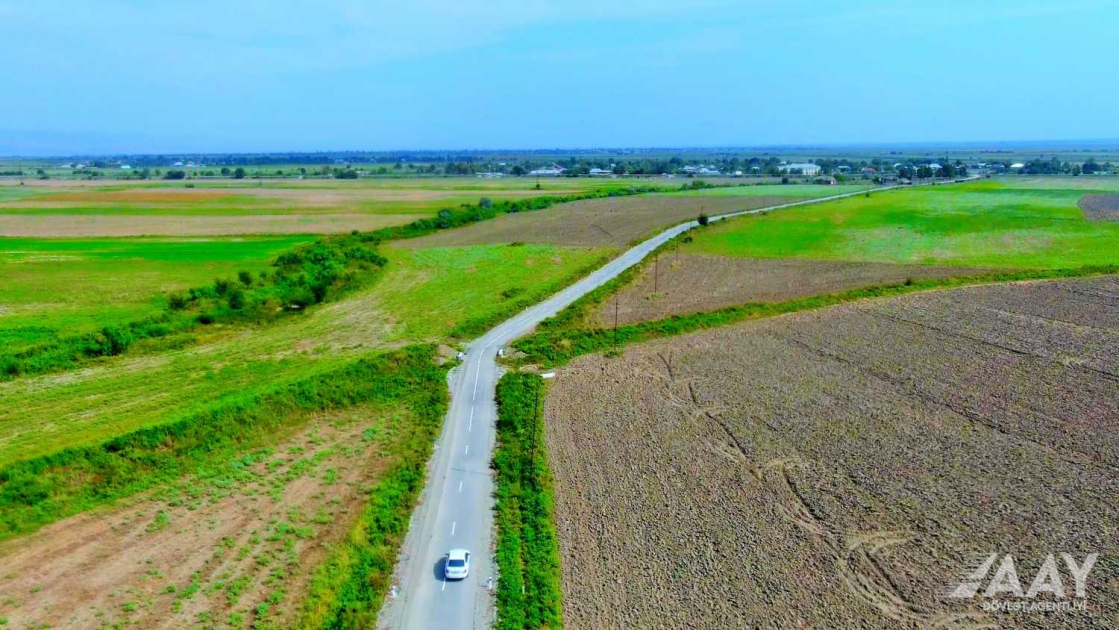 Ağsuda 12 yaşayış məntəqəsini birləşdirən yolun tikintisi yekunlaşıb&nbsp;VİDEO